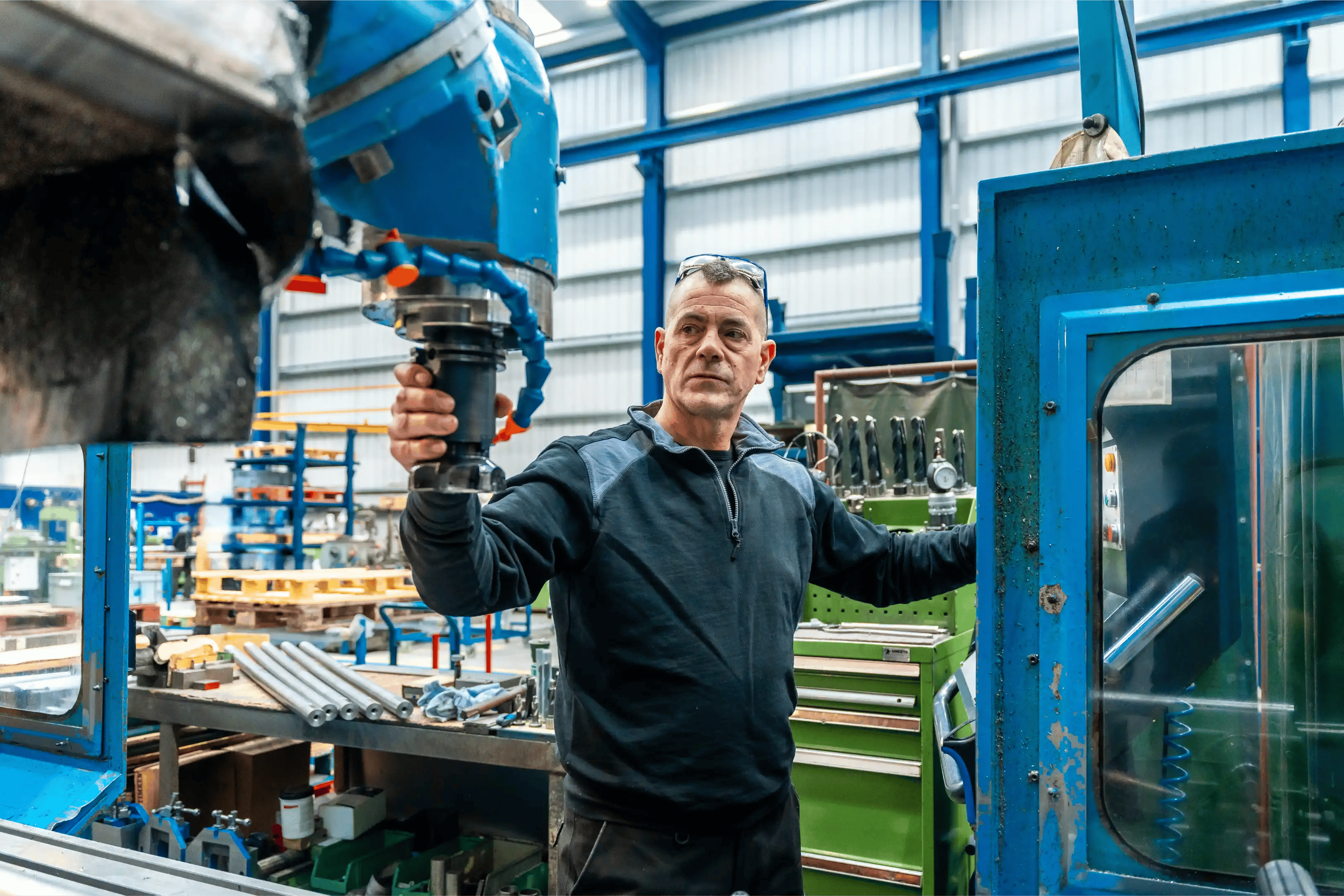 engineer-working-in-front-of-automated-cnc-machine-2024-12-09-04-47-33-utc